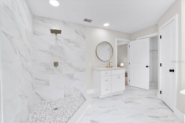 Bathroom, Dual Sink Vanities, Interior, Marble, Marble Walls, Recessed Lighting