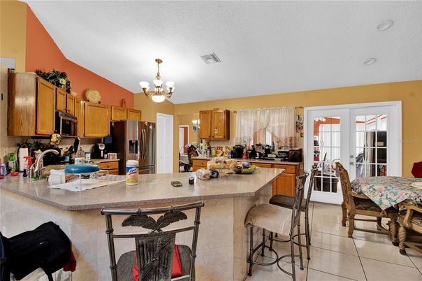 Chandelier, Dining room, Interior, Kitchen, Stainless Steel Appliances