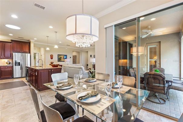Chandelier, Dining room, Interior, Kitchen, Living room, Pendant Lights, Recessed Lighting, Stainless Steel Appliances