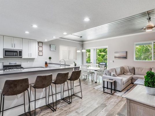 Dining room, Interior, Kitchen, Living room, Pendant Lights, Recessed Lighting, Stainless Steel Appliances, Wood Texture Flooring