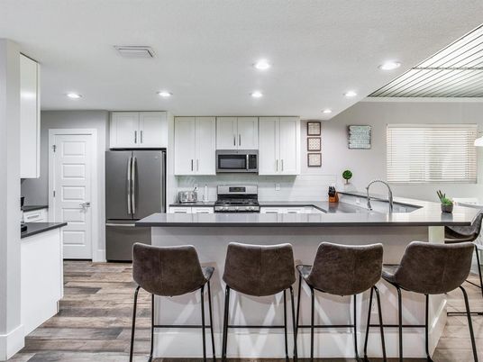 Interior, Kitchen, Recessed Lighting, Stainless Steel Appliances, Wood Texture Flooring