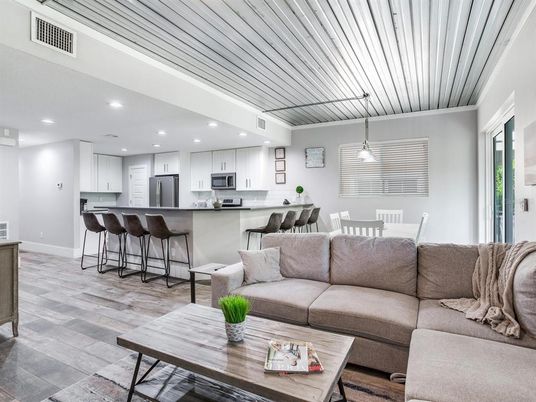 Dining room, Interior, Kitchen, Living room, Pendant Lights, Recessed Lighting, Stainless Steel Appliances, Wood Texture Flooring