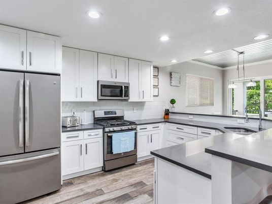 Interior, Kitchen, Pendant Lights, Recessed Lighting, Stainless Steel Appliances, Wood Texture Flooring