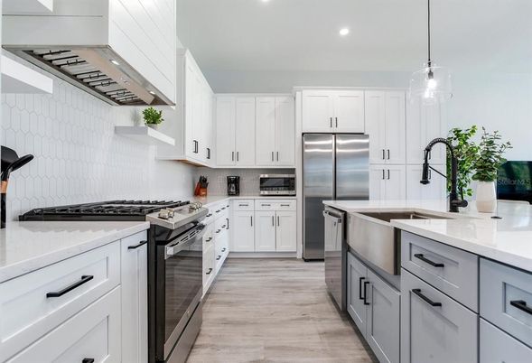 Interior, Kitchen, Pendant Lights, Recessed Lighting, Stainless Steel Appliances, Wood Texture Flooring