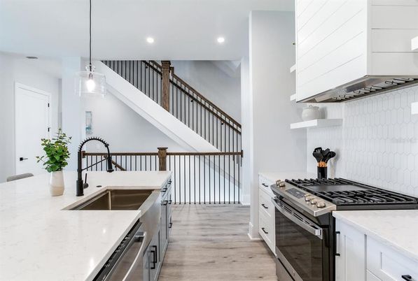 Interior, Kitchen, Pendant Lights, Recessed Lighting, Stainless Steel Appliances, Wood Texture Flooring