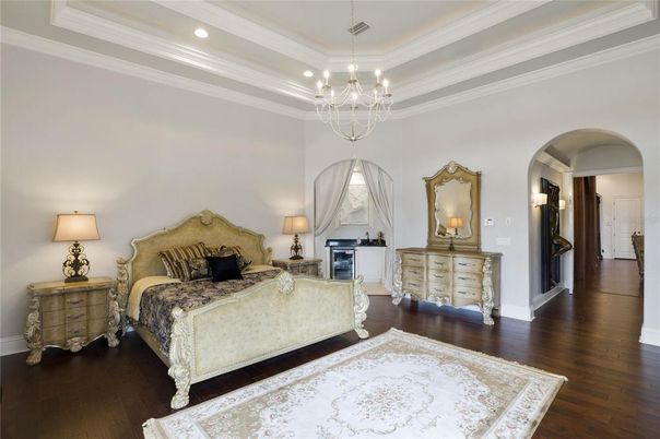 Bedroom, Chandelier, Fireplace, Interior, Recessed Lighting, Wood Texture Flooring