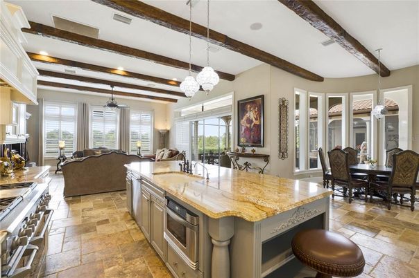 Chandelier, Dining room, Fireplace, Interior, Kitchen, Living room, Pendant Lights, Wooden Beams