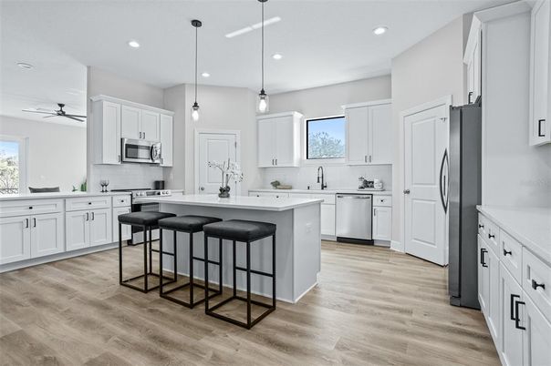Interior, Kitchen, Pendant Lights, Recessed Lighting, Stainless Steel Appliances, Wood Texture Flooring