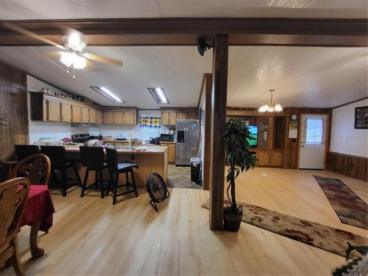 Dining room, Interior, Kitchen, Pendant Lights, Stainless Steel Appliances, Wood Texture Flooring