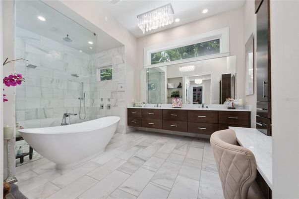 Bathroom, Dual Sink Vanities, Free Standing Baths, Glass Shower, Interior, Marble, Marble Walls, Pendant Lights, Recessed Lighting
