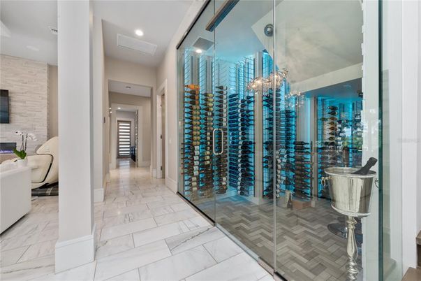 Chandelier, Interior, Marble, Recessed Lighting, Stone Walls, Wine Storage