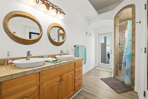 Bathroom, Dual Sink Vanities, Interior, Tile Countertops, Wood Texture Flooring