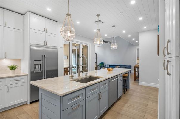 Interior, Kitchen, Pendant Lights, Recessed Lighting, Stainless Steel Appliances, Wood Texture Flooring