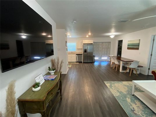 Dining room, Interior, Kitchen, Recessed Lighting, Stainless Steel Appliances, Wood Texture Flooring