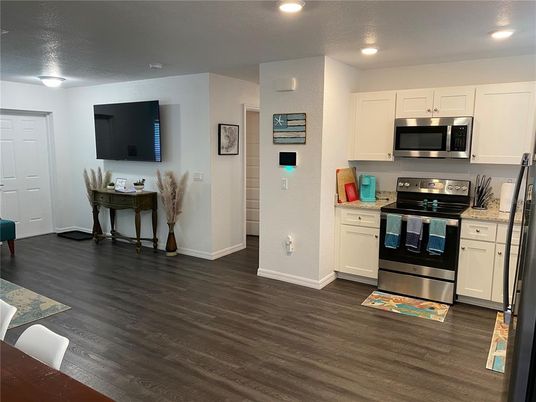 Interior, Kitchen, Recessed Lighting, Stainless Steel Appliances, Wood Texture Flooring