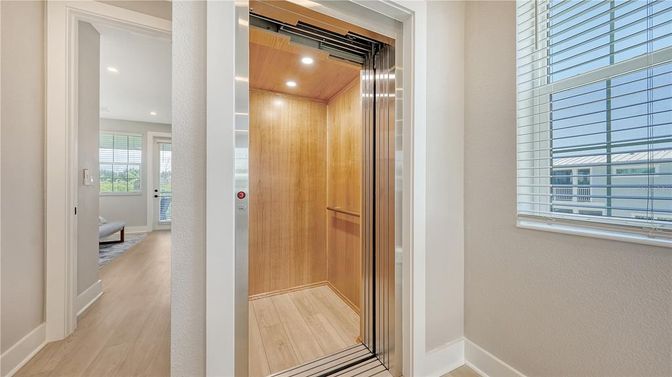 Elevator, Interior, Recessed Lighting, Wooden Ceilings, Wood Texture Flooring, Wooden Walls