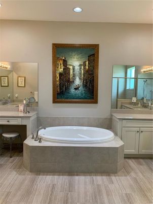 Bathroom, Dual Sink Vanities, Interior, Recessed Lighting, Wood Texture Flooring
