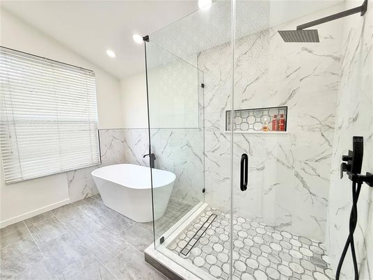 Bathroom, Free Standing Baths, Glass Shower, Interior, Marble Walls, Recessed Lighting