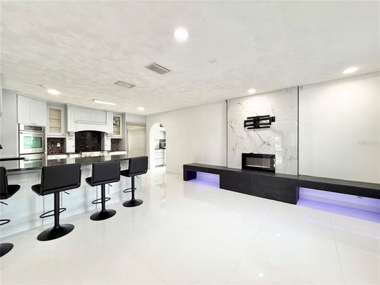 Interior, Kitchen, Marble Walls, Recessed Lighting, Stainless Steel Appliances