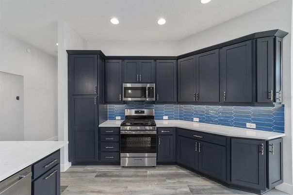 Interior, Kitchen, Recessed Lighting, Stainless Steel Appliances, Wood Texture Flooring