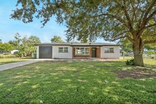 Attached, Backyard, Exterior, Facade, Brick Facade, Ranch
