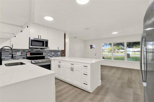 Interior, Kitchen, Recessed Lighting, Stainless Steel Appliances, Wood Texture Flooring