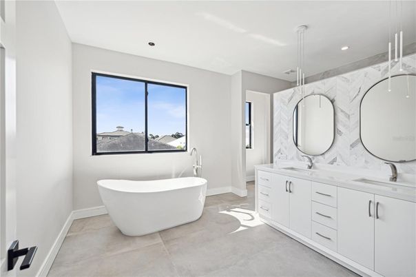 Bathroom, Dual Sink Vanities, Free Standing Baths, Interior, Marble Walls, Recessed Lighting