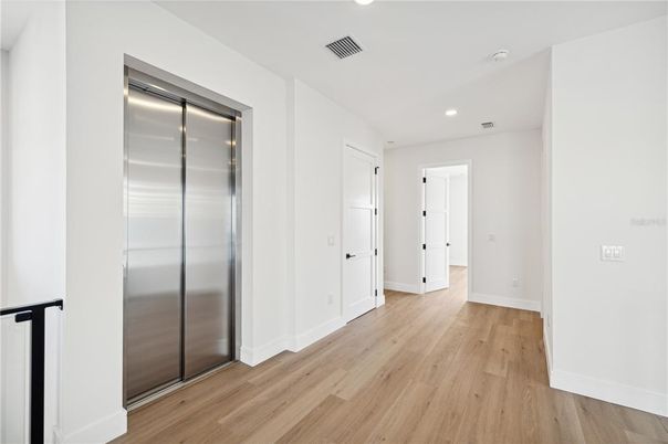 Elevator, Empty room, Interior, Recessed Lighting, Wood Texture Flooring