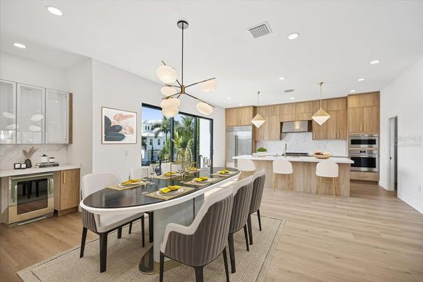 Dining room, Interior, Kitchen, Pendant Lights, Recessed Lighting, Stainless Steel Appliances, Wood Texture Flooring