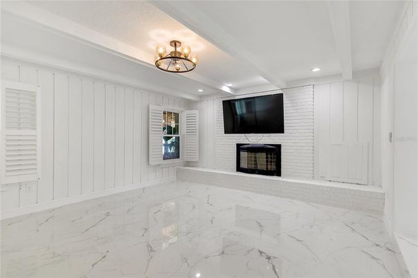 Chandelier, Empty room, Fireplace, Interior, Marble, Recessed Lighting