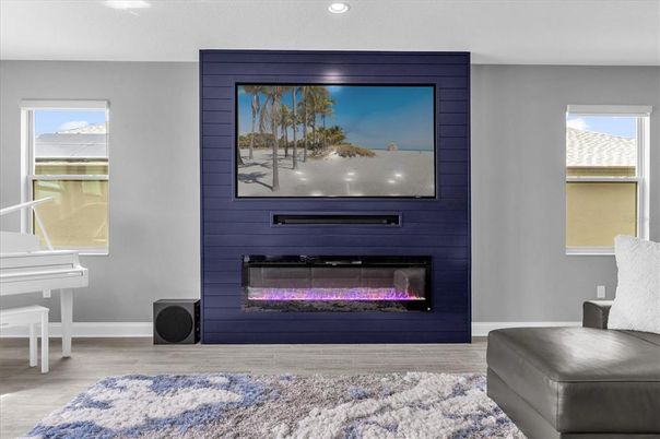 Fireplace, Interior, Piano, Recessed Lighting, Wood Texture Flooring