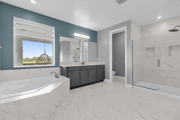 Bathroom, Dual Sink Vanities, Glass Shower, Interior, Marble, Marble Walls, Recessed Lighting