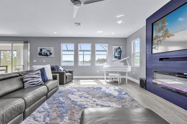 Fireplace, Interior, Living room, Piano, Recessed Lighting, Wood Texture Flooring