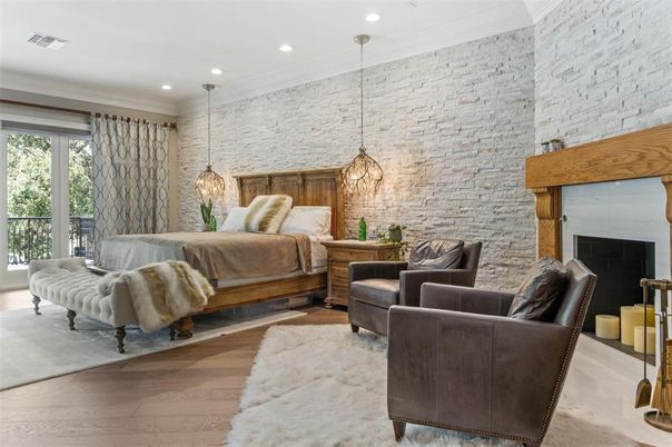 Bedroom, Chandelier, Fireplace, Interior, Living room, Pendant Lights, Recessed Lighting, Stone Walls, Wood Texture Flooring