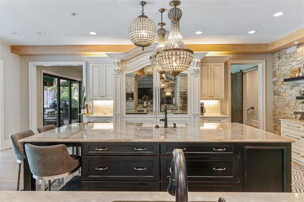 Chandelier, Dining room, Interior, Kitchen, Pendant Lights, Recessed Lighting, Stainless Steel Appliances, Stone Walls
