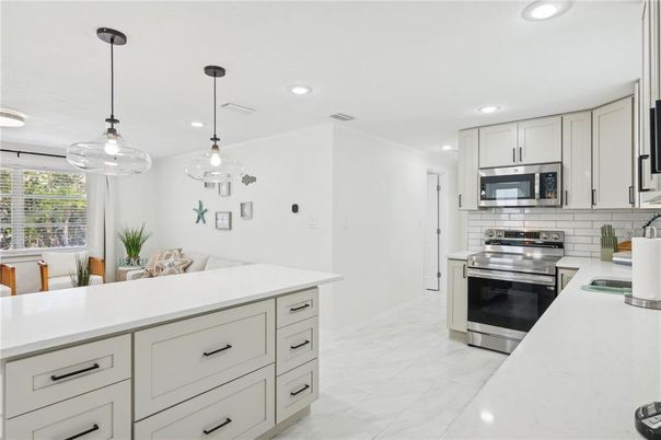 Interior, Kitchen, Marble, Pendant Lights, Recessed Lighting, Stainless Steel Appliances