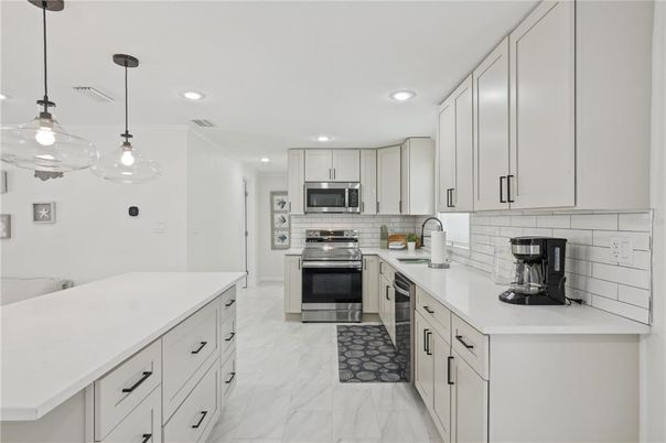 Interior, Kitchen, Marble, Pendant Lights, Recessed Lighting, Stainless Steel Appliances