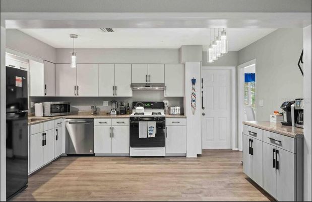 Chandelier, Interior, Kitchen, Pendant Lights, Stainless Steel Appliances, Wood Texture Flooring
