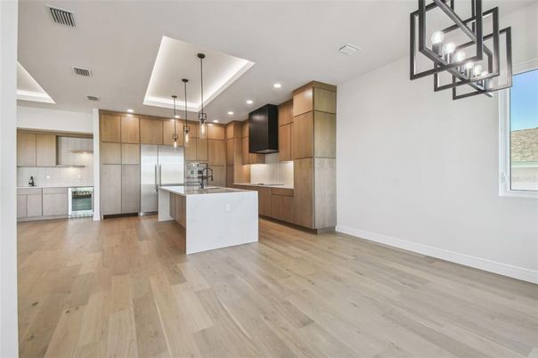 Interior, Kitchen, Pendant Lights, Recessed Lighting, Stainless Steel Appliances, Wood Texture Flooring