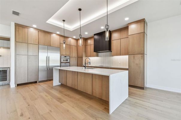 Interior, Kitchen, Pendant Lights, Recessed Lighting, Stainless Steel Appliances, Wood Texture Flooring