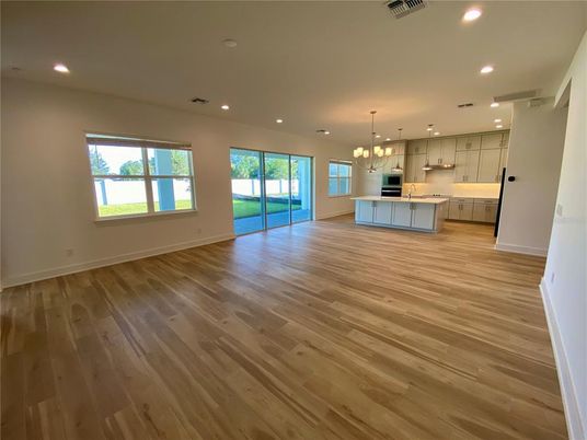 Chandelier, Empty room, Interior, Kitchen, Pendant Lights, Recessed Lighting, Wood Texture Flooring