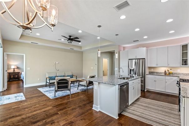 Dining room, Interior, Kitchen, Living room, Pendant Lights, Recessed Lighting, Stainless Steel Appliances, Wood Texture Flooring