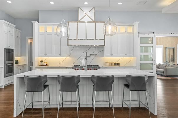 Interior, Kitchen, Marble Walls, Pendant Lights, Recessed Lighting, Stainless Steel Appliances, Wood Texture Flooring