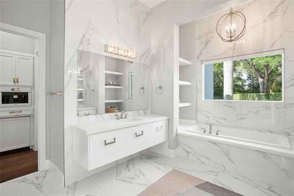 Bathroom, Dual Sink Vanities, Interior, Marble, Marble Walls, Pendant Lights