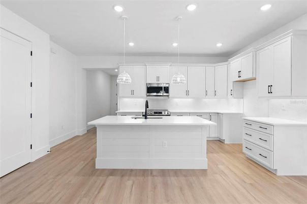 Interior, Kitchen, Pendant Lights, Recessed Lighting, Stainless Steel Appliances, Wood Texture Flooring