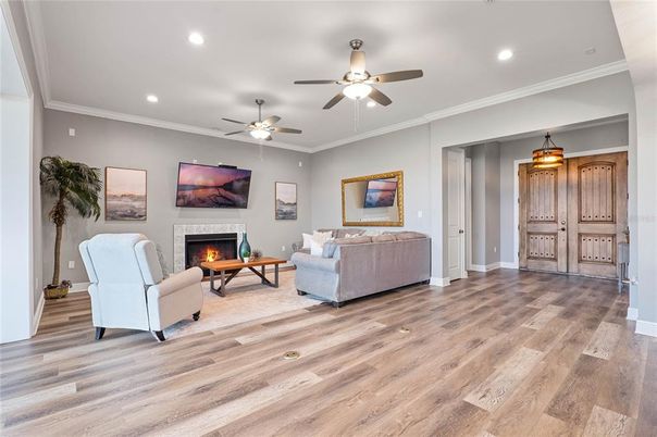 Fireplace, Interior, Living room, Recessed Lighting, Wood Texture Flooring