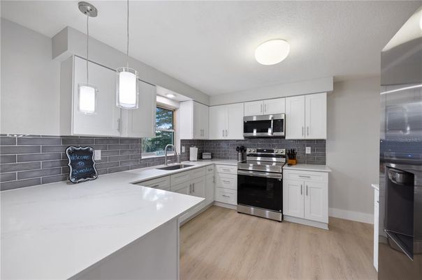 Interior, Kitchen, Pendant Lights, Stainless Steel Appliances, Wood Texture Flooring
