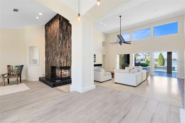 Fireplace, Interior, Living room, Pendant Lights, Recessed Lighting, Wood Texture Flooring, Wooden Walls