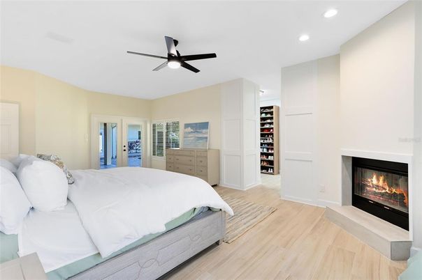 Bedroom, Fireplace, Interior, Recessed Lighting, Wood Texture Flooring