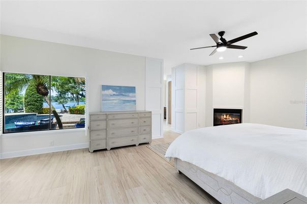 Bedroom, Fireplace, Interior, Recessed Lighting, Wood Texture Flooring